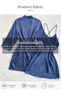 Detailed view of dark blue satin robe and slip dress showing silk-like texture and sheen
