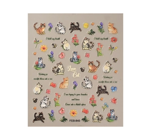 Detail of 5D embossed nail stickers featuring cute realistic cat and flower patterns