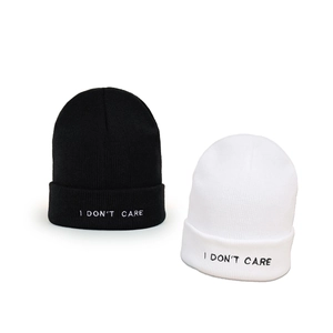 Minimalist black and white knitted beanie hats with I DON'T CARE embroidery