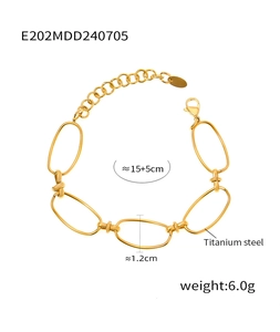 Macro view of chunky golden titanium steel chain bracelet with dimensions and specs