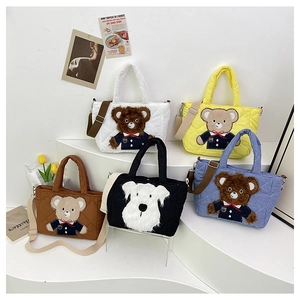 Detailed display of assorted quilted cartoon bear handbags for girls in various vibrant colors