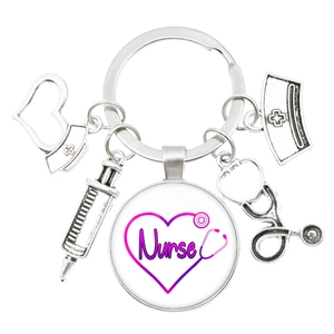 Nurse keychain with syringe and stethoscope charms featuring a purple heart design