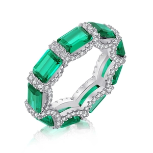 Luxurious S925 silver ring featuring emerald cut green zircon and pavé side stones