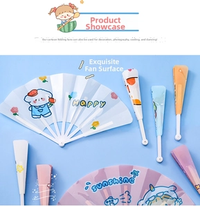 Detail view of colorful cartoon folding fans with translucent matte finish and puppy designs