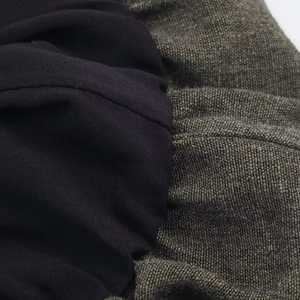 Minimalist short sleeve dress featuring black lining and brown textured fabric detail