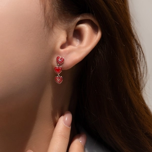 S925 sterling silver triple red heart enamel long earrings on model