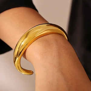 Polished 18K gold plated stainless steel C-shaped open crescent bangle bracelet