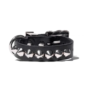 Punk rock black leather bracelet featuring silver cone rivets and adjustable metal buckle