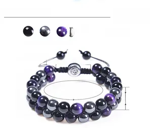 Detail of 8mm purple tiger eye and obsidian double-layer beaded bracelet with Om charm