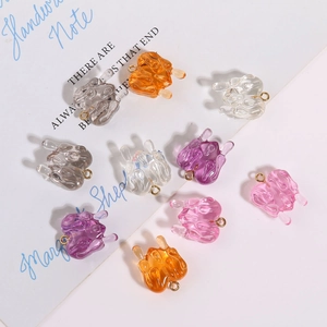 Translucent heart resin pendants with metallic loops in various pastel colors