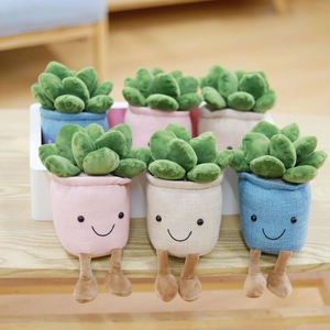 Set of 6 cute plush succulent plants with smiling faces and dangling legs on wood surface