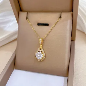 Elegant gold-plated teardrop pendant necklace with sparkling zircons in a gift box