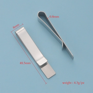 Minimalist matte silver stainless steel necktie clip shown on a blue background