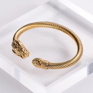 18k gold plated stainless steel twisted cable open bracelet with lion head terminals