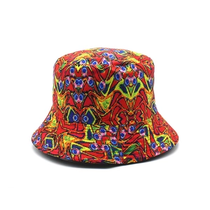 Detail of cotton sun hat featuring vibrant abstract geometric prints and breathable fabric