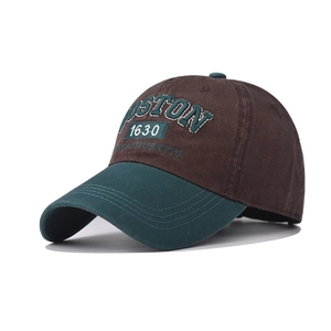 Close-up of Boston 1630 3D embroidery on a brown and green cotton baseball cap