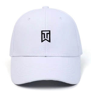 Close-up of black embroidered logo on a high-quality white cotton baseball cap