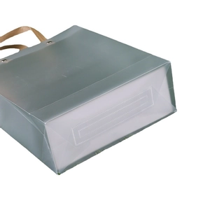 Frosted semi-transparent PP gift bag in grey-green with brown fabric handles
