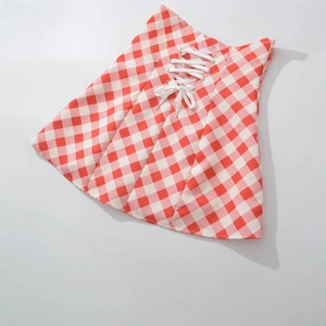 Red and white plaid halter A-line mini dress featuring a decorative front drawstring lace-up