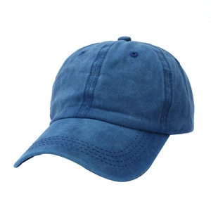Distressed dark blue washed cotton baseball cap with six-panel design and curved brim