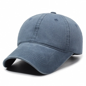 Classic washed dark blue baseball cap with a soft top and pre-curved brim for unisex wear