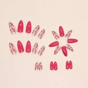 Hot pink almond press-on nails with floral pattern on polished long stiletto tips