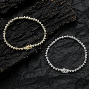 Elegant heart-shaped tennis bracelet set in gold and silver finish with AAA zircon stones