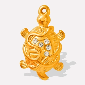 Detailed view of 18k gold plated turtle pendant featuring inlaid sparkling rhinestones