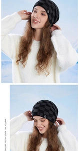 Detail of checkered knit beanie with round logo patch and warm fleece lining