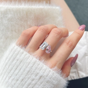 S925 sterling silver ring featuring pear-cut pink diamond and radiant-cut white stone