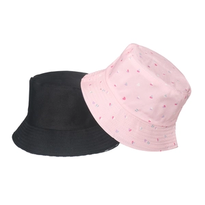 Set of two cotton bucket hats in solid black and pink with heart patterns