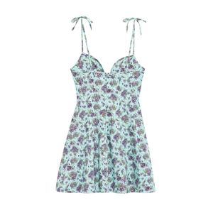 Close-up of floral print poplin dress with sweetheart neckline and shoulder ties