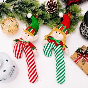 Christmas elf candy cane hanging ornaments in red and green stripes with festive decor