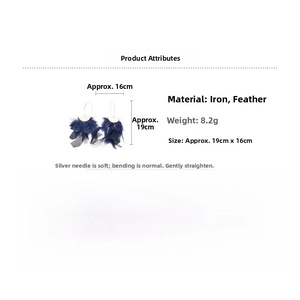 Detailed view of long dark blue feather earrings with gold metal accents and size labels