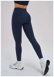 Vue arrière détaillée du pantalon de yoga taille haute bleu foncé avec couture push-up