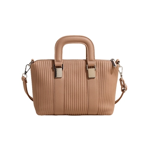 Elegant beige pleated leather tote bag with round handles and adjustable shoulder strap