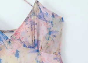 Close-up of floral print chiffon dress with V-neckline and delicate spaghetti straps