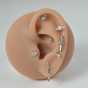 7Pcs silver stainless steel wing and sword ear cartilage piercing set with zircons
