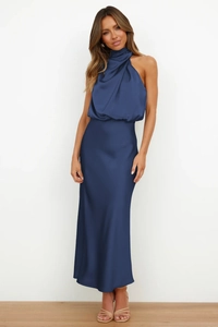 Detail of dark blue halter neck satin dress with floor-length elegant silk-like fabric