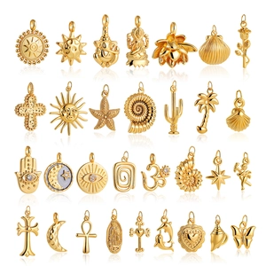 18K gold plated DIY pendants collection with evil eye and cross charms on white background
