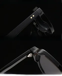 Detail of black sunglasses with reinforced metal hinges and golden star rivets on temples