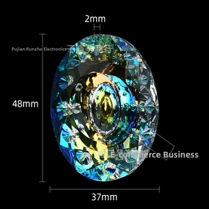 Macro detail of a large faceted AB crystal teardrop pendant for suncatchers and DIY decor
