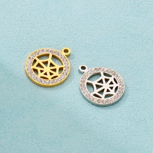 Spider web necklace pendants in gold and silver with cubic zirconia inlays