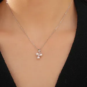 Elegant geometric pendant necklace with three white pearls and cubic zirconia on silver chain