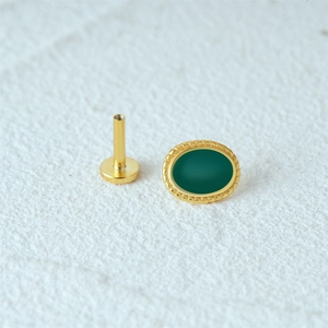 Detailed view of 16G gold S925 silver stud with green opal and flat back screw thread