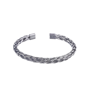 Close-up of woven mesh pattern on waterproof stainless steel flexible cuff bracelet