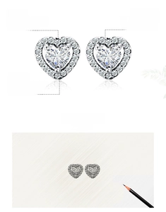 Macro shot of 925 sterling silver heart stud earrings with halo cubic zirconia stones