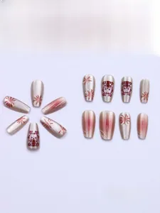 Detailed view of silver cat-eye press-on nails with 3D fireworks and cartoon pig art