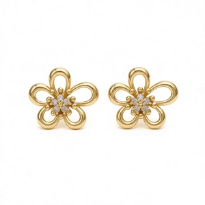 Elegant gold hollow flower stud earrings with sparkling cubic zirconia center stones