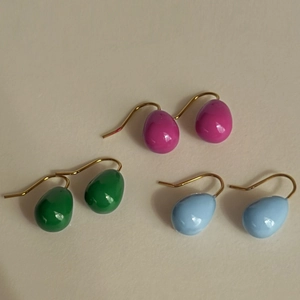 Detailed set of three colorful teardrop earrings in pink, green, and light blue enamel